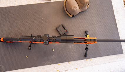 top down shot of a Bushnell riflescope mounted to a rifle