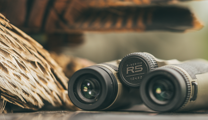 R5 Binos in front of turkey feathers