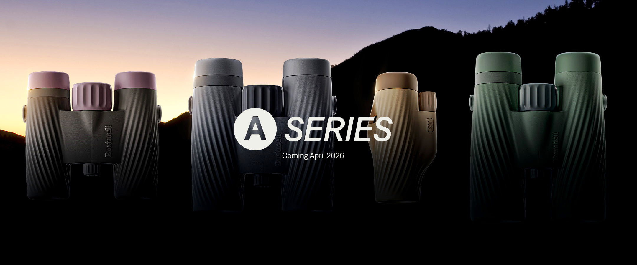 A row of five sleek binoculars in different colors is displayed against a mountain silhouette at sunset. Text in the center reads A SERIES, Coming April 2026.