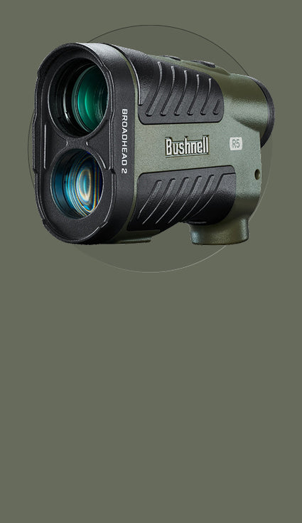 Rangefinder with Bushnell branding on a gray background