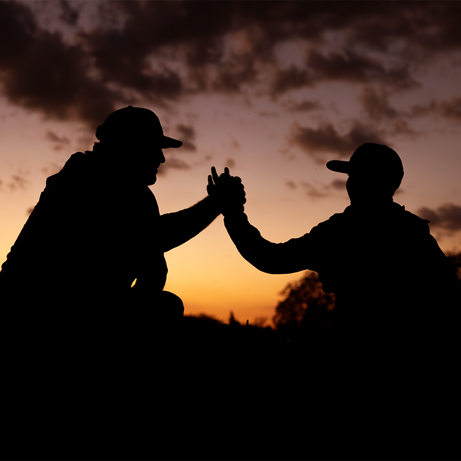 Father and son high fiving