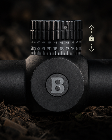 Close-up of a black rifle scope with a brand logo on a dark background