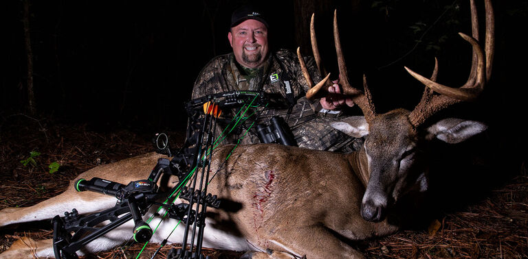 Bowhunter with whitetail