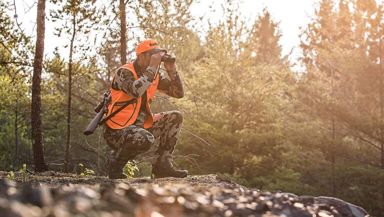 Hunter with multiple Bushnell products