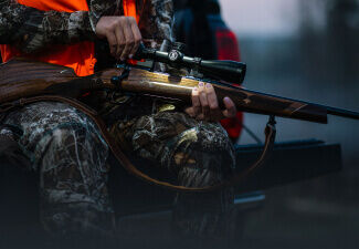 Hunter adjusting Bushnell Riflescope