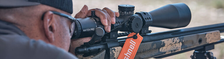 Man aiming with Bushnell scope