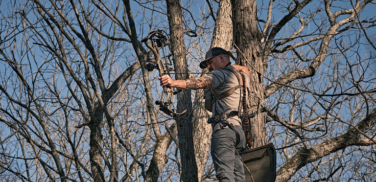 Bowhunter in treestand