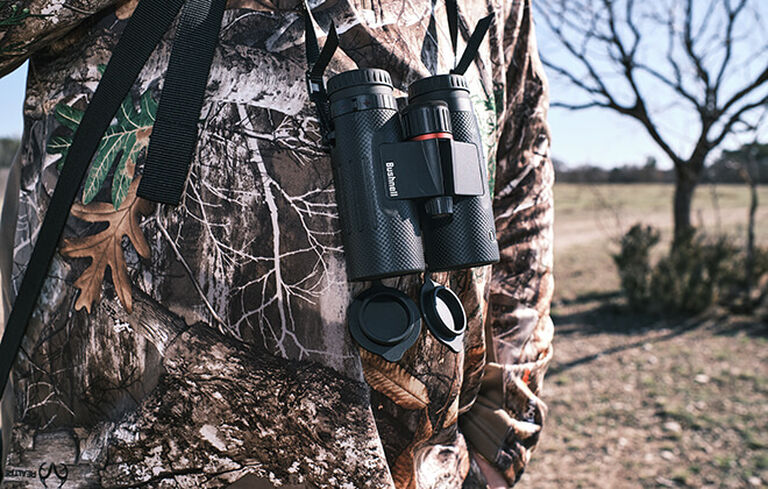 Hunter wearing Nitro Binoculars with neck straps