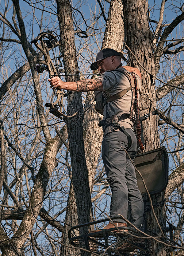 Bowhunter in treestand