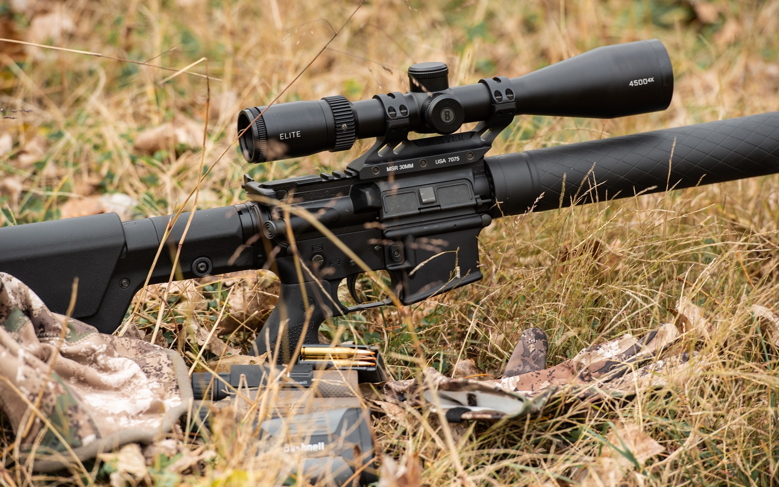 Bushnell Elite Riflescope on wooded background