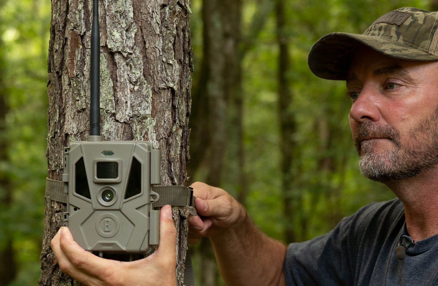Hunter setting up CelluCORE 20 Trail Camera