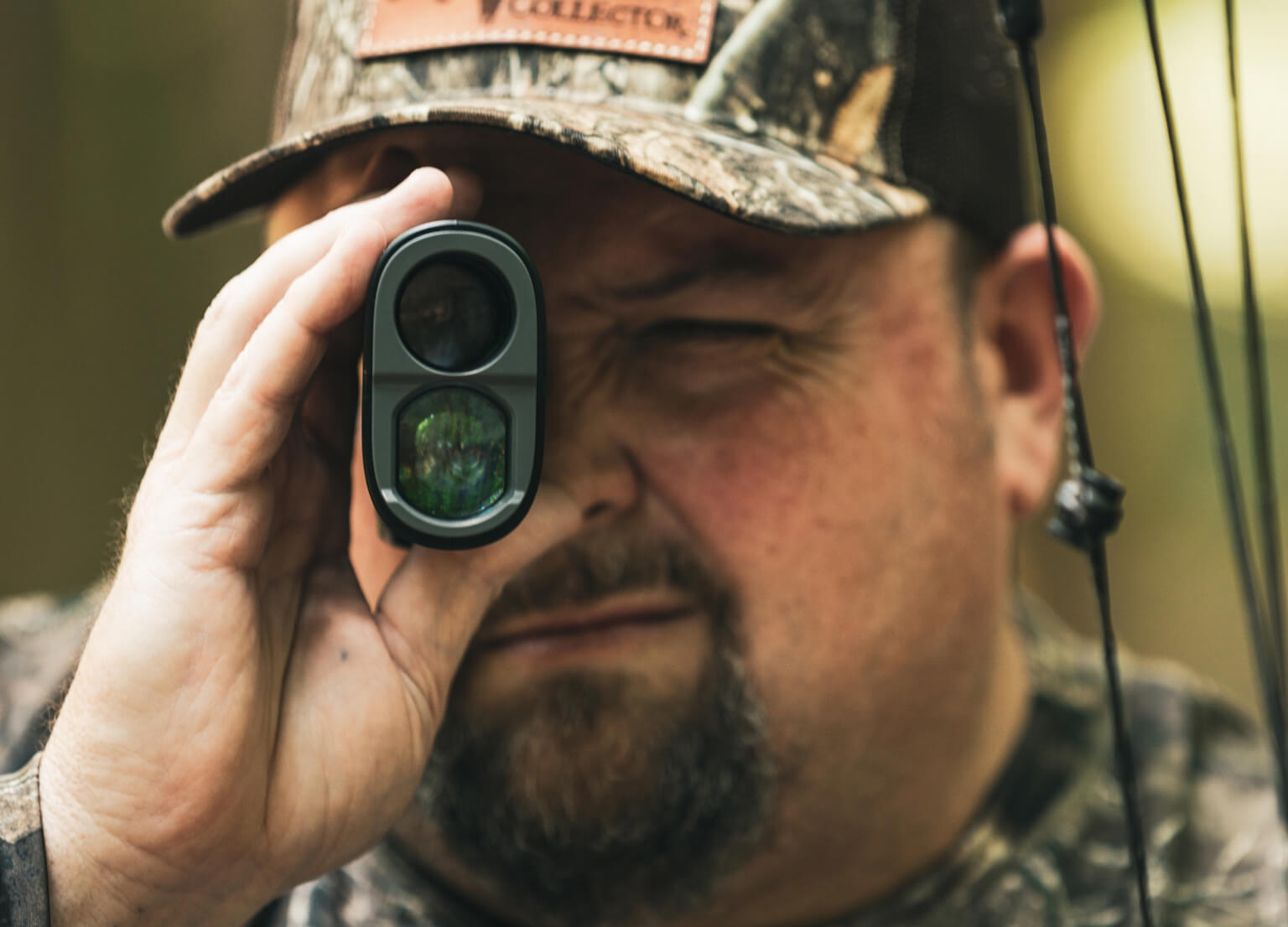 T-Bone Turner looking through Bushnell Laser Rangefinder